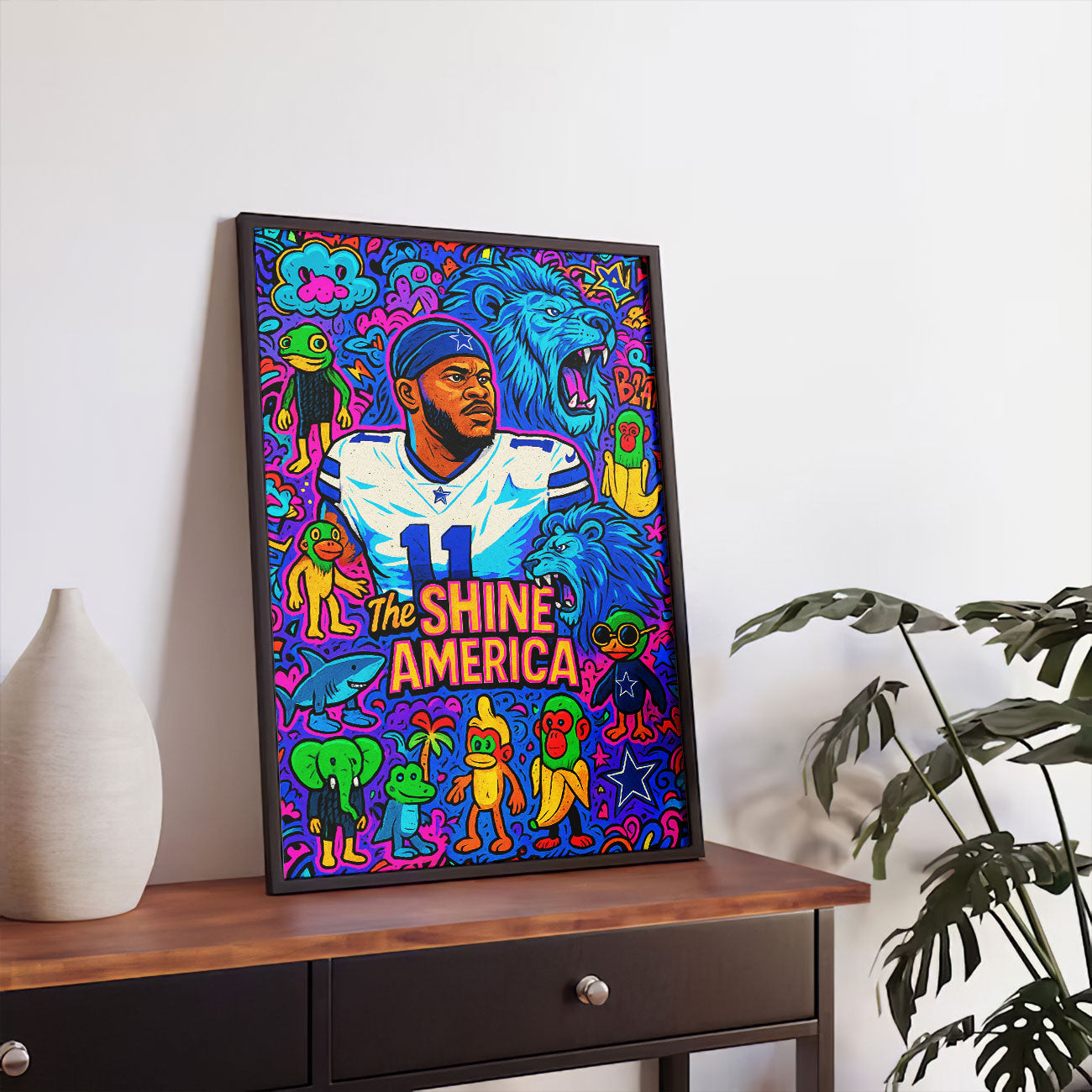 Vibrant pop art canvas print of a football player in a blue and white uniform with number 11, surrounded by colorful cartoon blue lions, monkeys, and various whimsical symbols, with "THE SHINE AMERICA" text