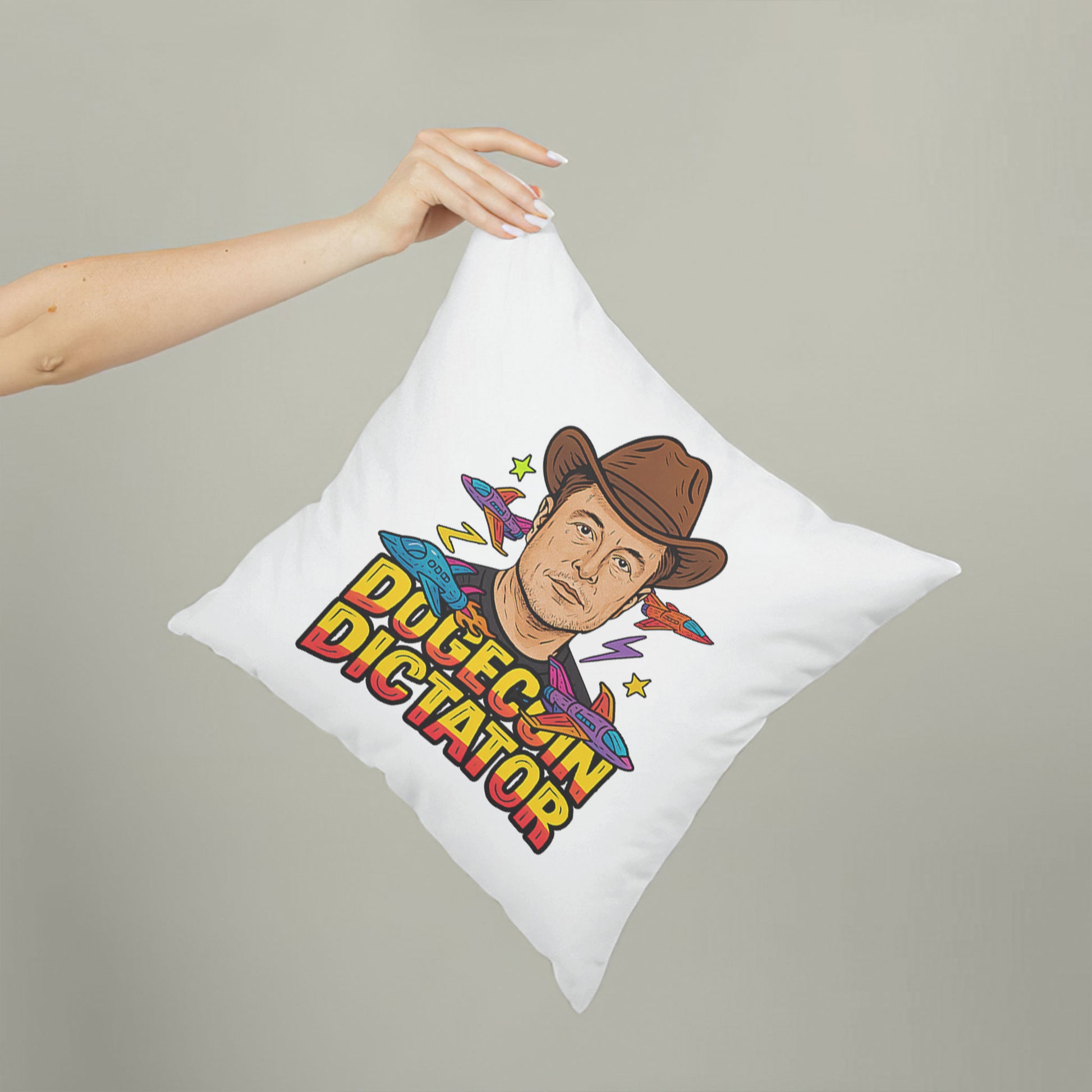 White square meme pillow featuring a "DOGECOIN DICTATOR" design with a man in a brown cowboy hat, surrounded by rockets and stars.