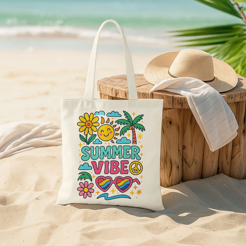 White beach tote bag with colorful 'Happy Summer Vibes' graphics including a happy sun, daisy, palm tree, clouds, and heart-shaped sunglasses