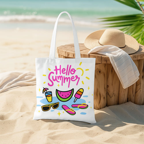 Close-up of a white tote bag featuring a bright, playful summer design with various beach and vacation items.