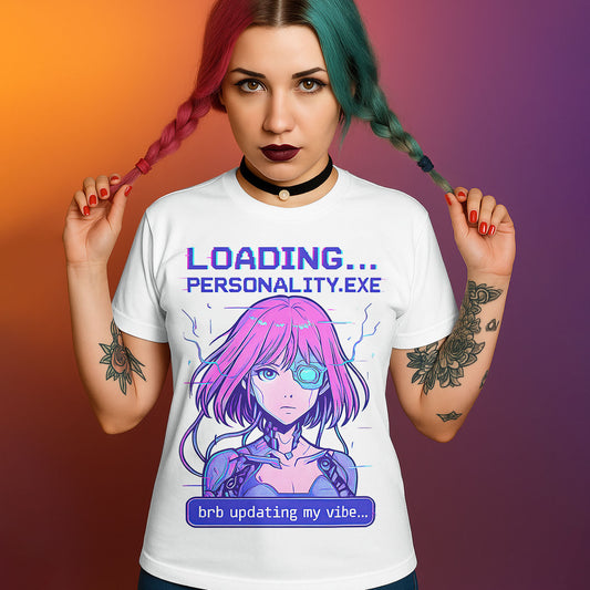 White graphic t-shirt featuring cyberpunk anime girl with pink hair, "LOADING... PERSONALITY.EXE" and "brb updating my vibe..." text