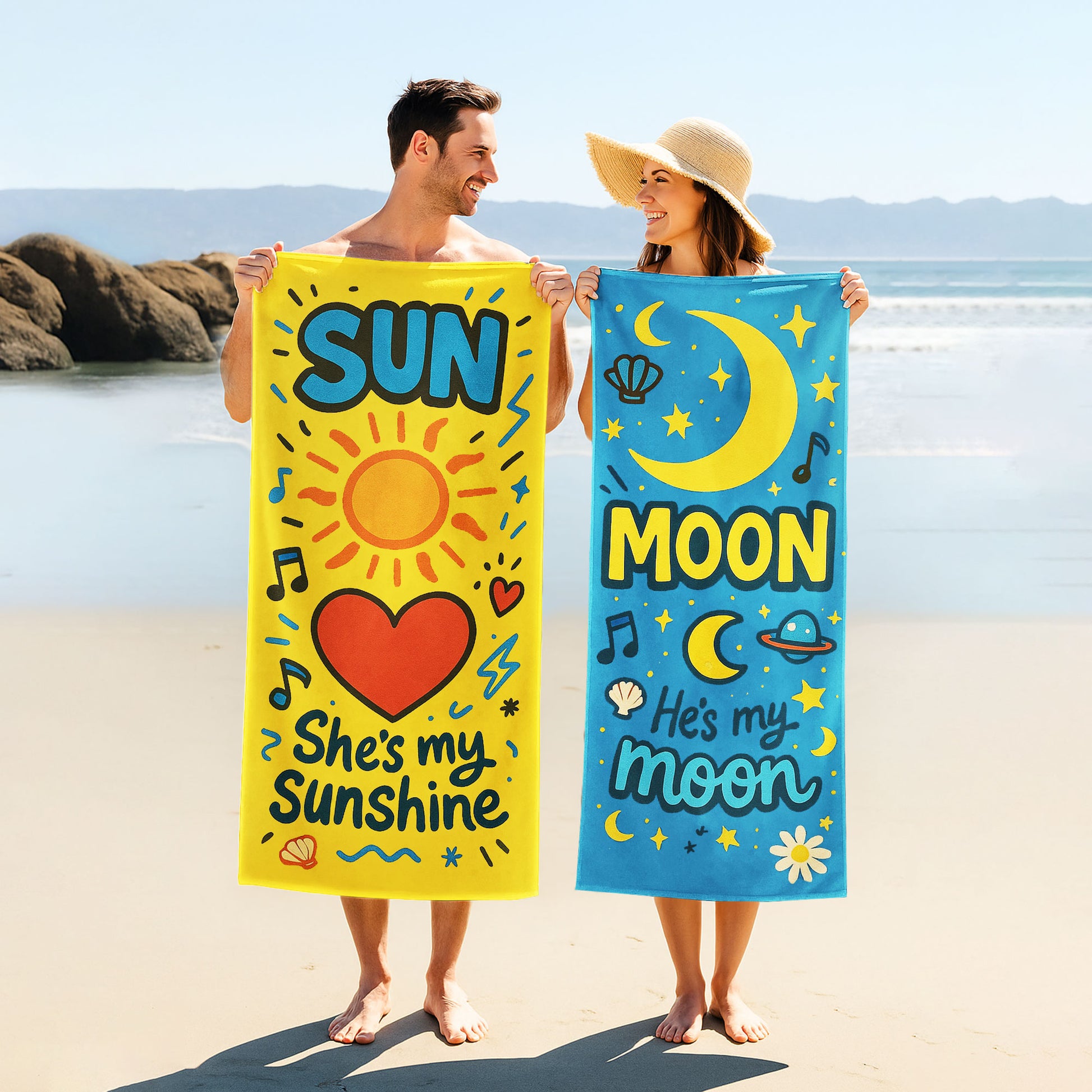 Matching beach towels for couples – one yellow towel with “She’s My Sunshine” and one blue towel with “He’s My Moon” hanging by the beach.
