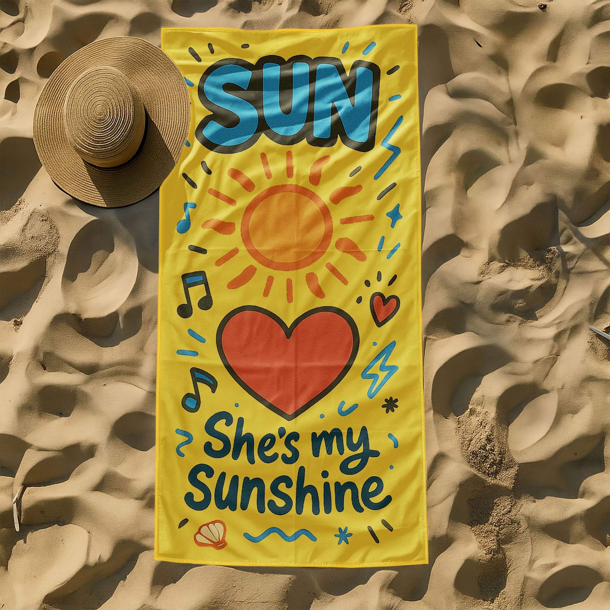Matching beach towels for couples – one yellow towel with “She’s My Sunshine” and one blue towel with “He’s My Moon” hanging by the beach.