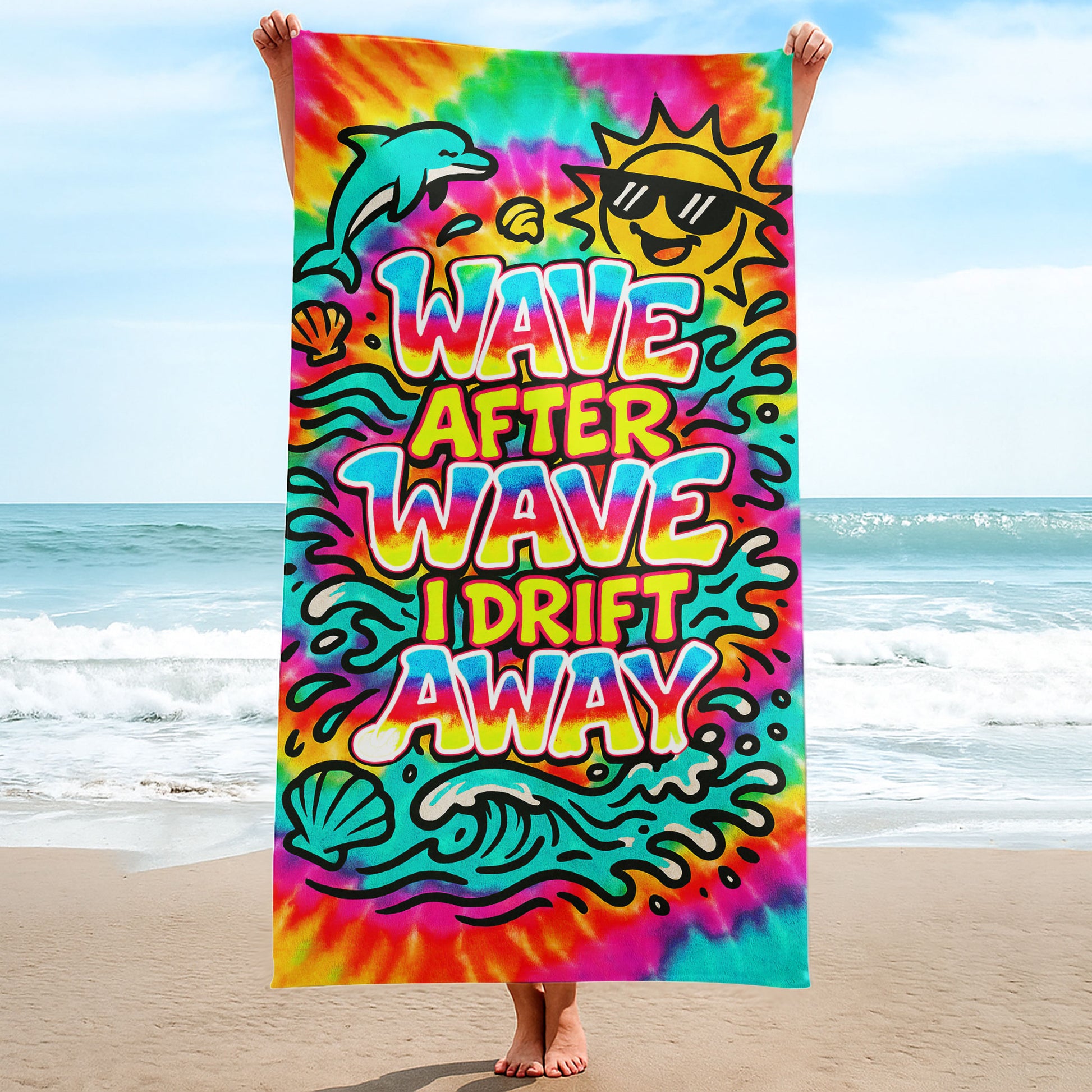 Tie-Dye "Wave After Wave" Beach Towel with colorful tie-dye background, a jumping dolphin, smiling sun, seashells, and "WAVE AFTER WAVE I DRIFT AWAY" text on a beach with ocean background.