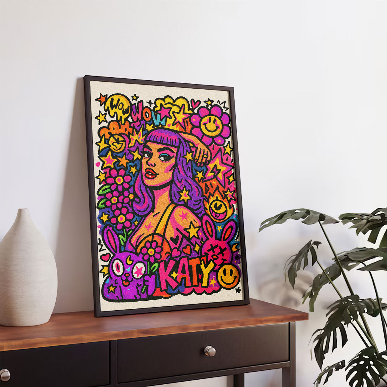 Vibrant pop princess art print with purple hair, surrounded by colorful stars, flowers, smiley faces, and bunnies, featuring "KATY" text