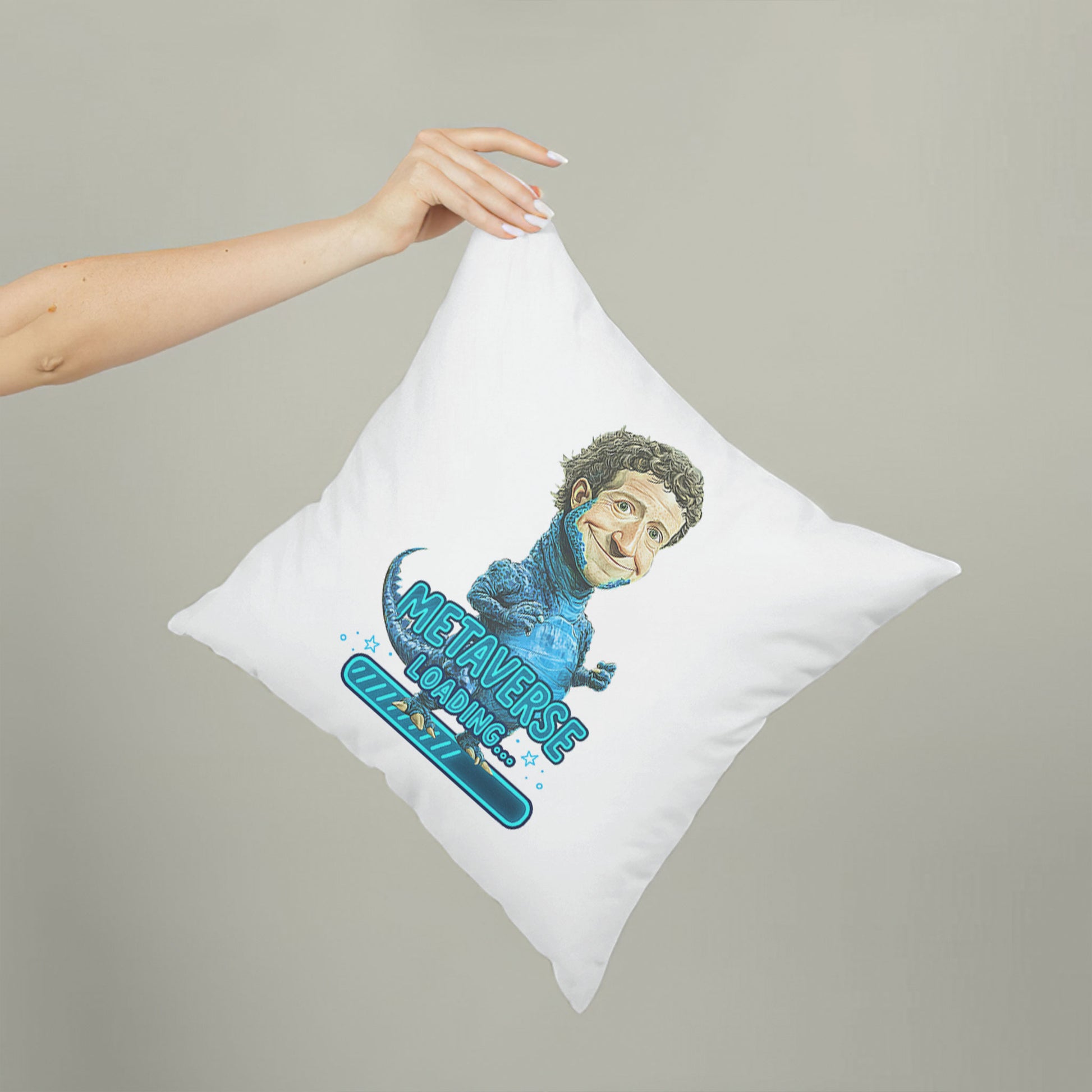 White square meme pillow featuring a blue reptilian character with curly hair, and "METAVERSE LOADING..." 