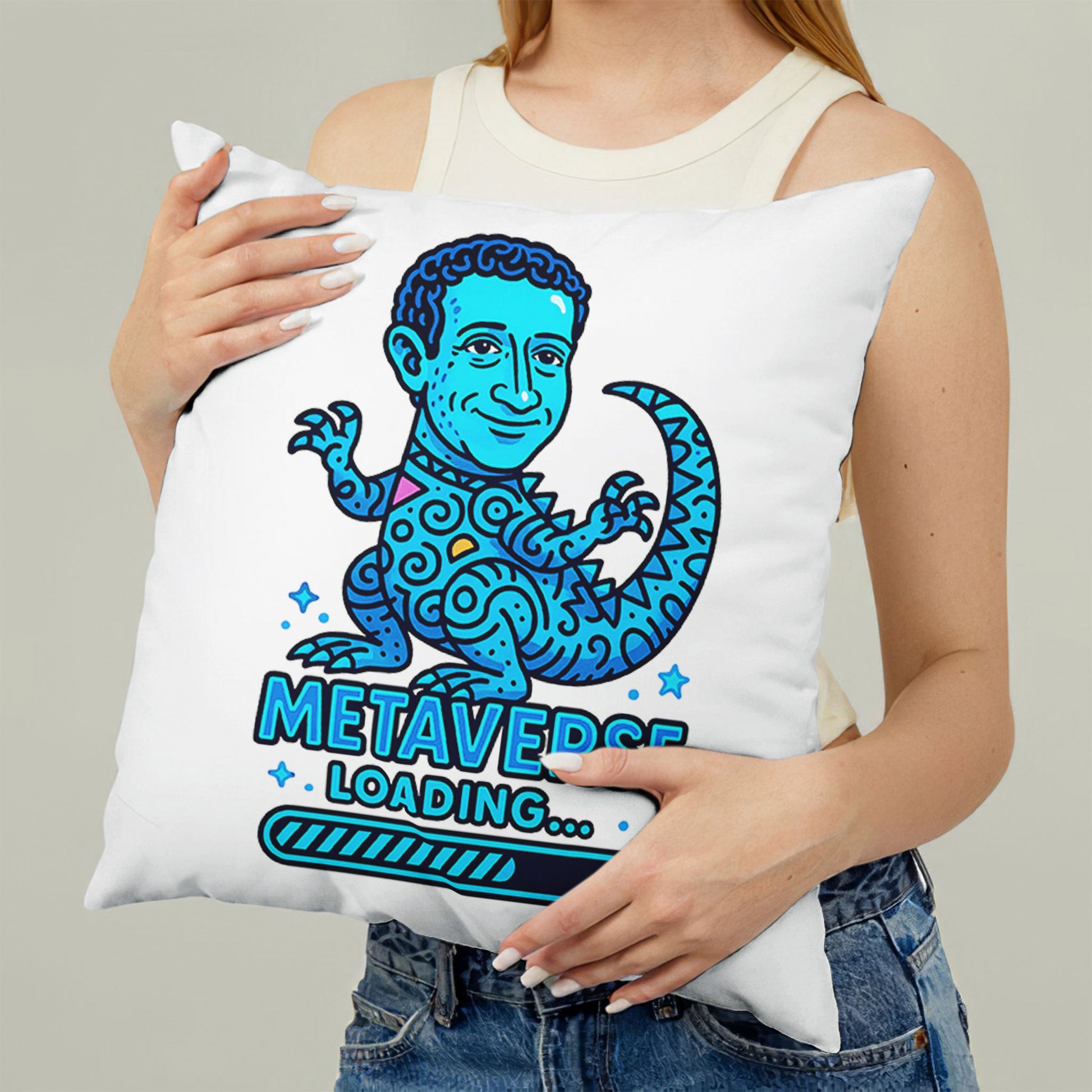 White square meme pillow featuring a blue reptilian character with curly hair and large eyes, above "METAVERSE LOADING..." text.